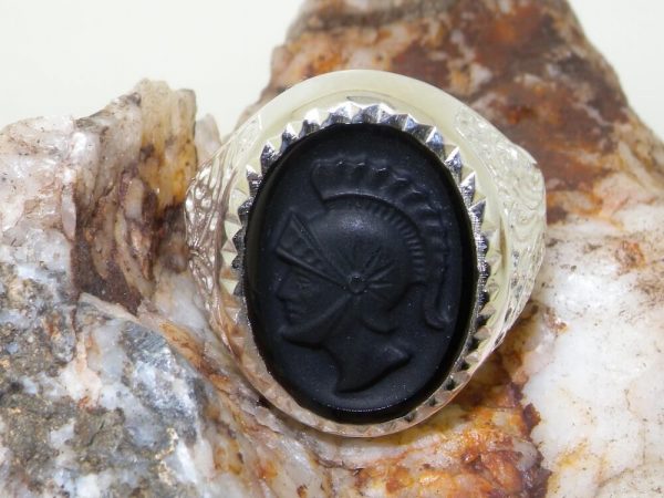 onyx silver ring on rock