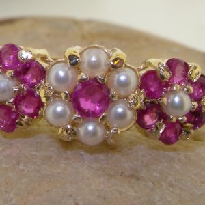 ruby and pearl triple flower ring