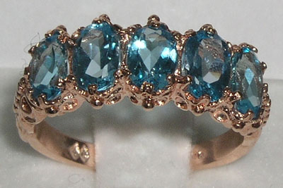 r2168.127-1.jpg Rose Gold Natural Blue Topaz Womens Eternity Ring